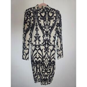 Black and cream full sequins long sleeve bodycon dress by Fashion Nova